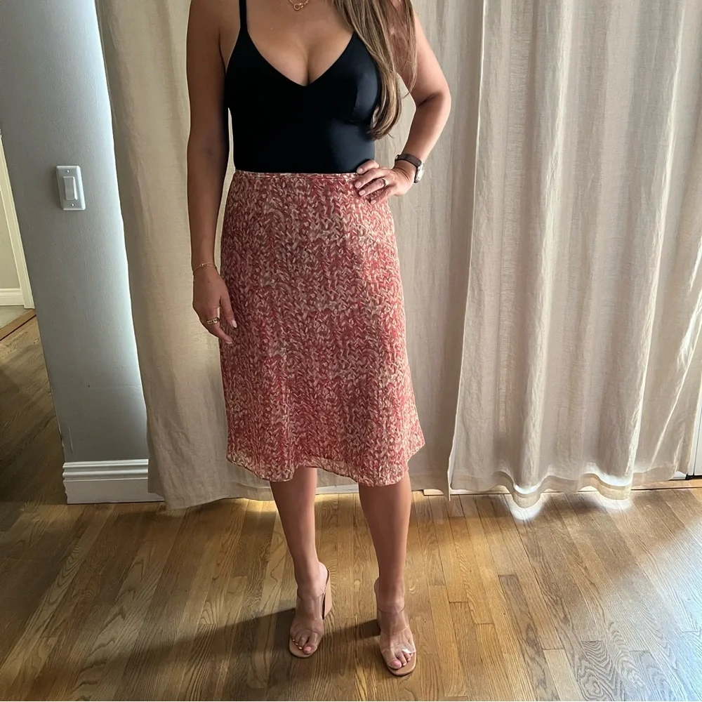 Styled Le Suit Skirt, Jones Sweater Tank, Coach Wristlet, Amrita Singh Earrings
